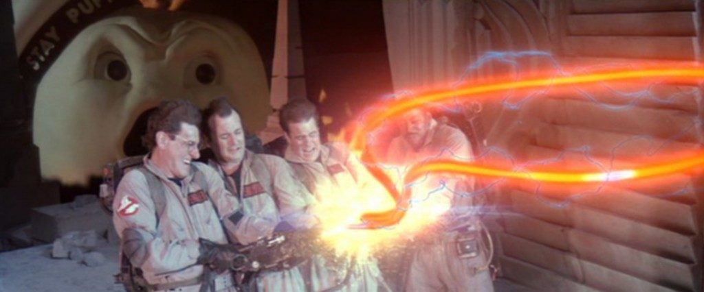 A scene from the 1984 film showing four members of the Ghostbusters defeating Gozer by crossing the streams from their proton packs.