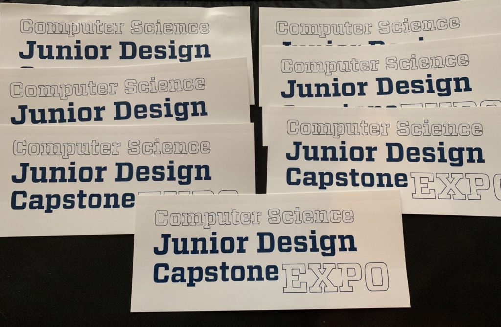 Laptop stickers up for grabs at the Spring 2019 Expo