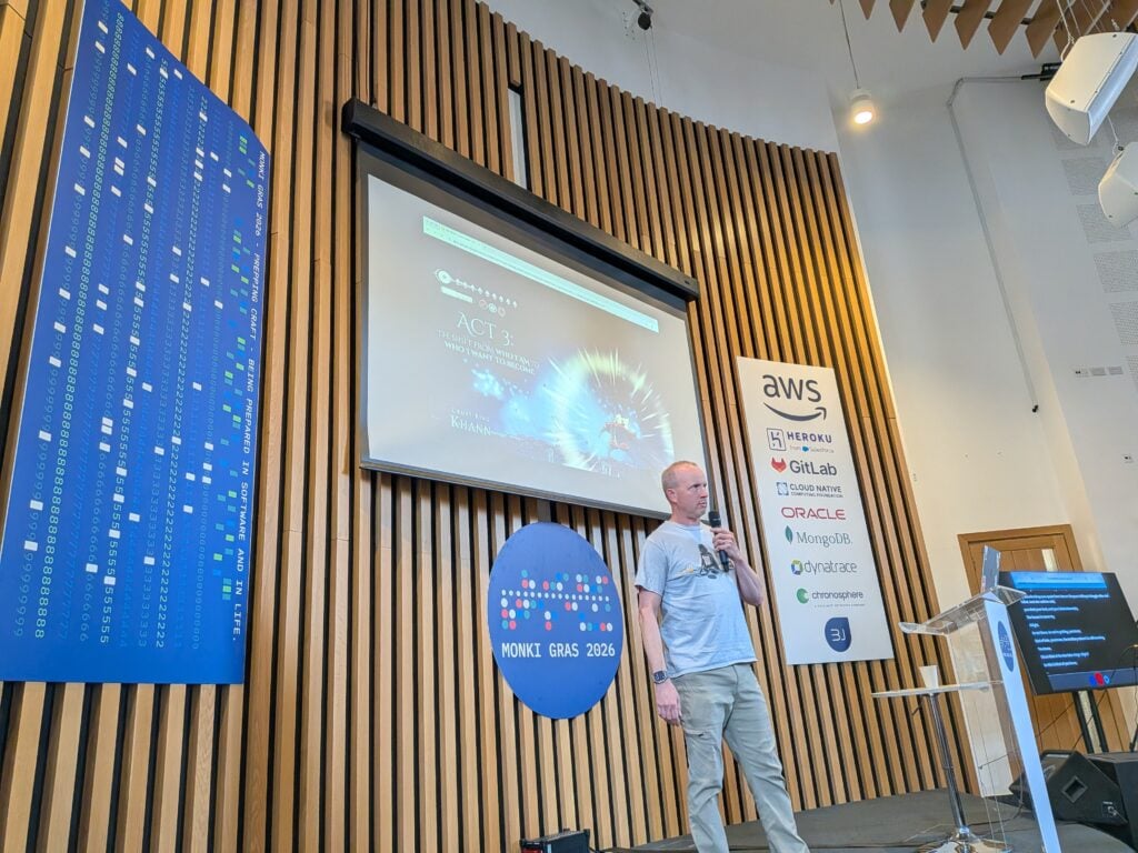 Adam Zimman on stage at Monki Gras 2026, showing the layout