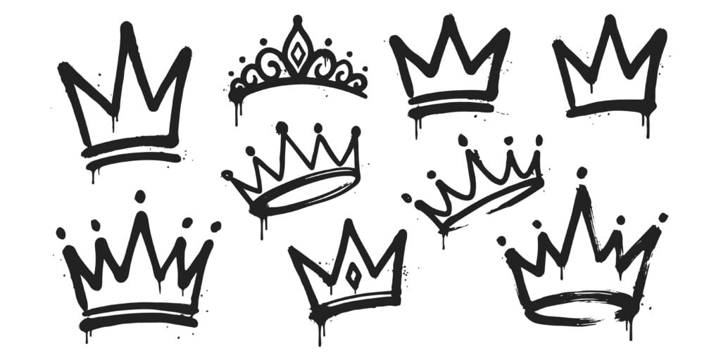 Set of black graffiti crown icons with paint drip effects