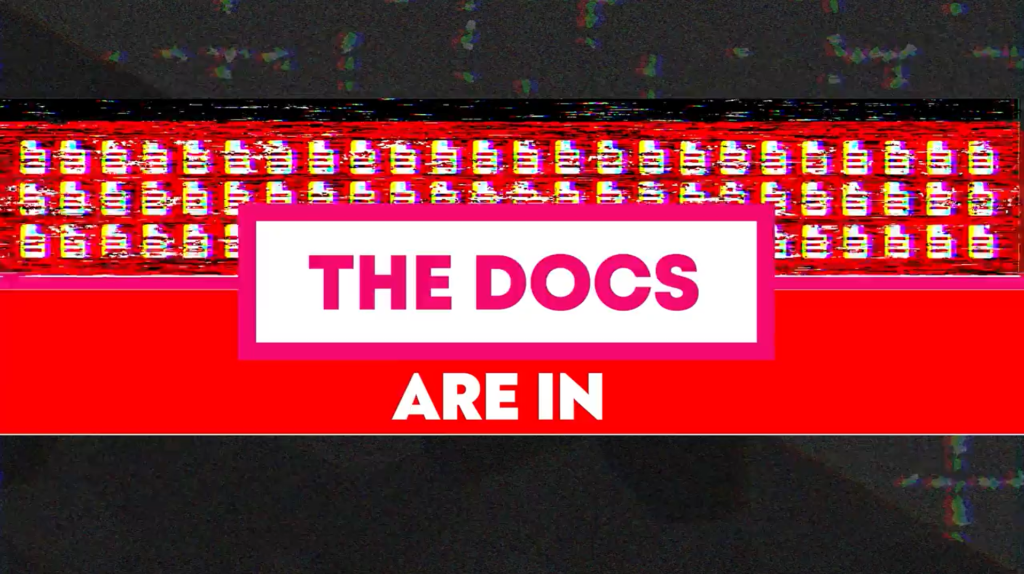 Title card with the text "The Docs Are In" against a backdrop of a pattern of repeating documentation icons