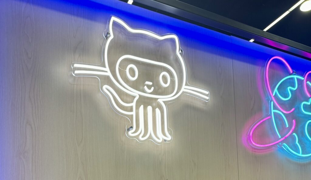 Neon Octocat sign from the GitHub Education booth