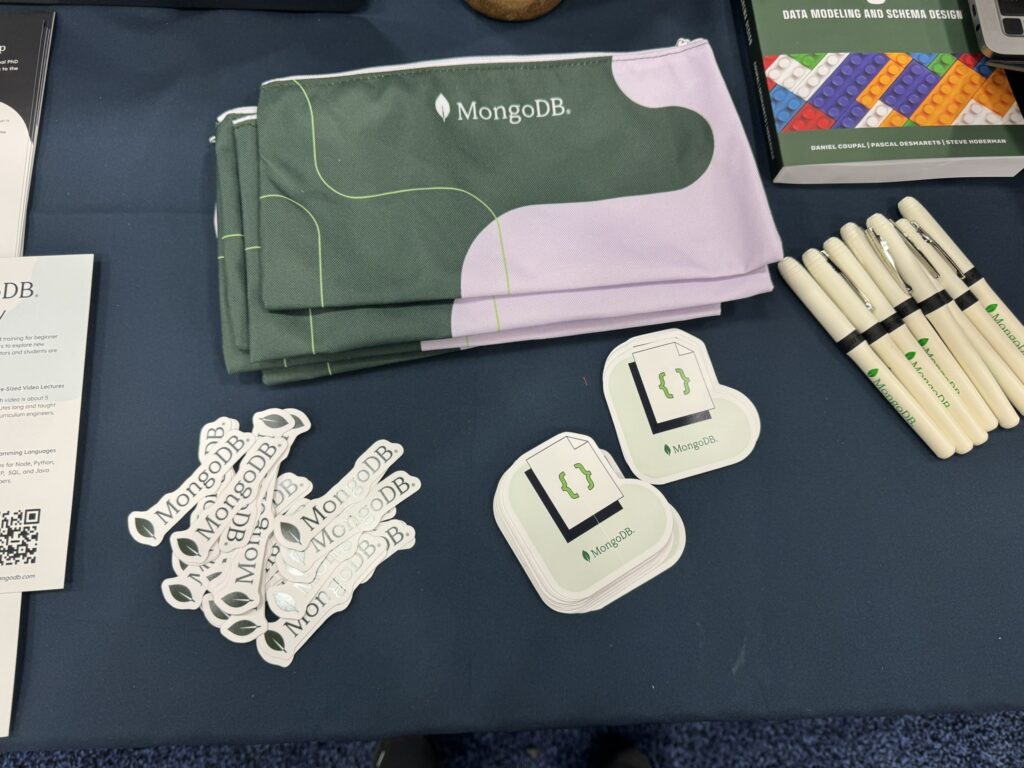 Stickers, pens, books, and other MongoDB swag